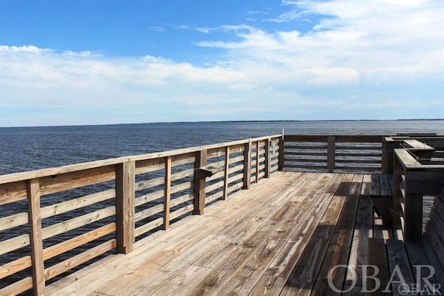 dock area featuring a water view