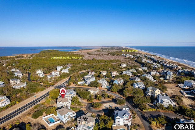 aerial view featuring a residential view and a water view