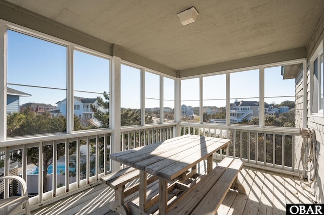 sunroom / solarium with a healthy amount of sunlight