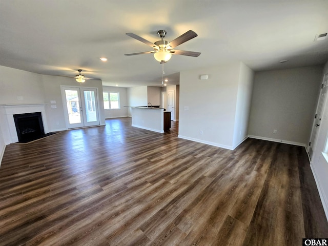 120 Dailey Rd Lot 1, Camden, NC 27921 - unfurnished living room with dark wood-style flooring, ceiling fan, recessed lighting, and baseboards