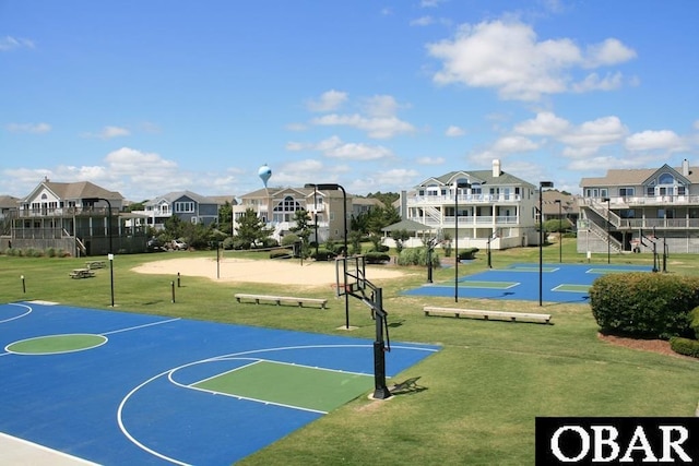 view of sport court with volleyball court, a residential view, and community basketball court