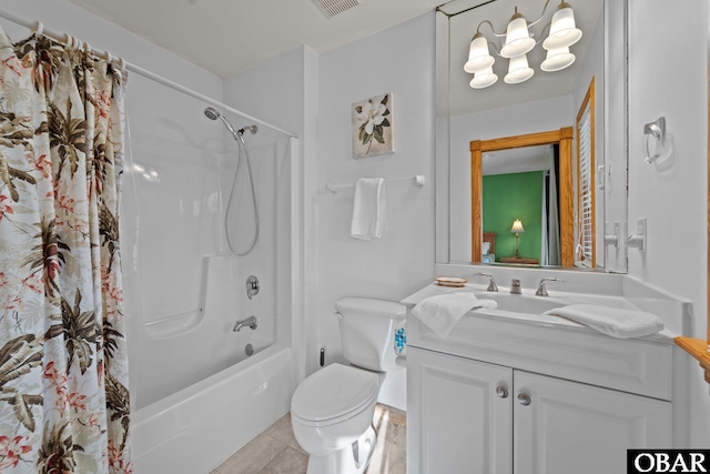 full bath with toilet, tile patterned floors, shower / bath combo with shower curtain, and vanity