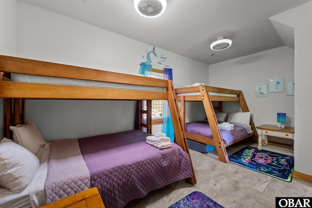 bedroom featuring vaulted ceiling