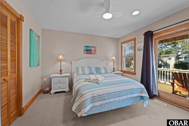 bedroom with carpet floors, access to exterior, visible vents, a ceiling fan, and baseboards