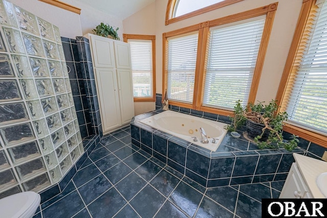 57390 Lighthouse Rd Lot 30, Hatteras, NC 27943 - bathroom featuring a jetted tub, walk in shower, tile patterned flooring, vanity, and lofted ceiling