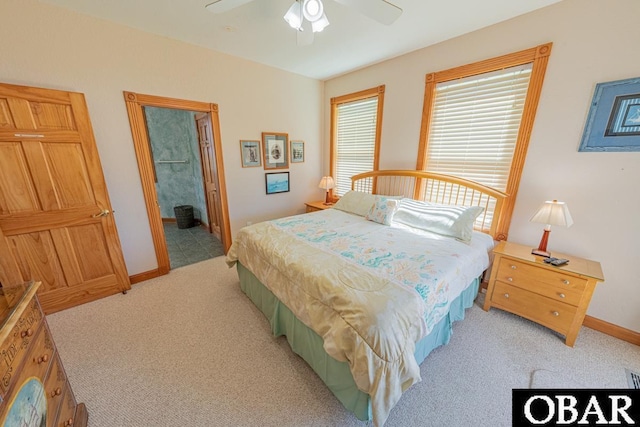 57390 Lighthouse Rd Lot 30, Hatteras, NC 27943 - bedroom featuring light colored carpet, ceiling fan, and connected bathroom