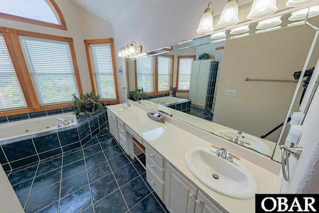 57390 Lighthouse Rd Lot 30, Hatteras, NC 27943 - full bathroom with vaulted ceiling, a jetted tub, double vanity, tile patterned floors, and a shower stall
