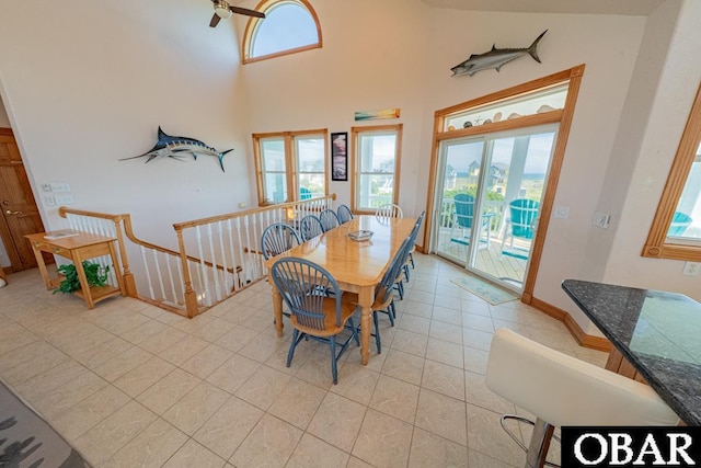 57390 Lighthouse Rd Lot 30, Hatteras, NC 27943 - dining area featuring light tile patterned floors and high vaulted ceiling
