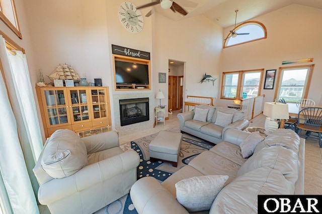 57390 Lighthouse Rd Lot 30, Hatteras, NC 27943 - living area with a ceiling fan, high vaulted ceiling, and a tile fireplace