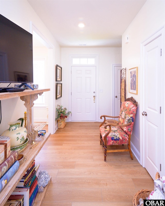 entrance foyer featuring light wood-type flooring