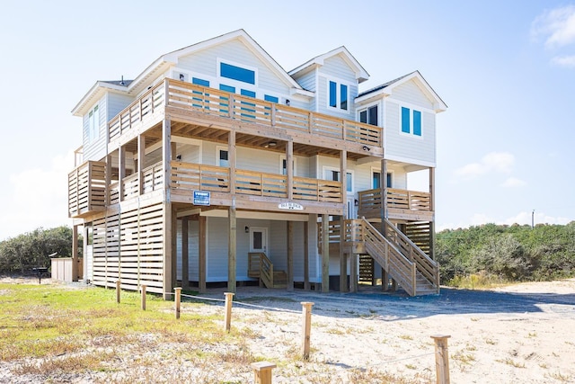 view of front of home featuring stairs