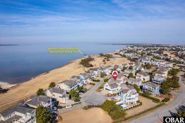 aerial view featuring a residential view and a water view