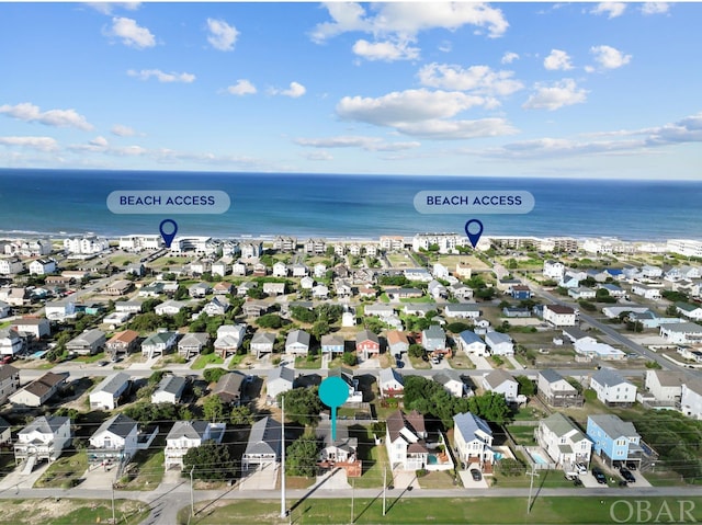 aerial view featuring a water view and a residential view