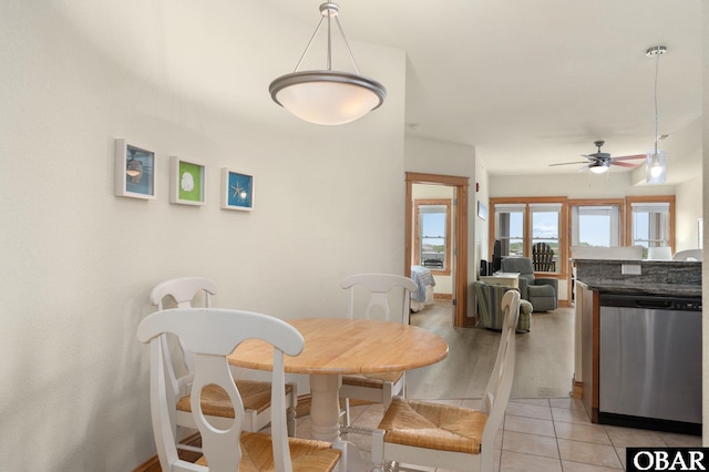 107 W Gray Eagle St Unit 213, Nags Head, NC 27959 - dining space with a ceiling fan and light tile patterned flooring