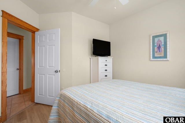 107 W Gray Eagle St Unit 213, Nags Head, NC 27959 - bedroom featuring light wood finished floors and ceiling fan