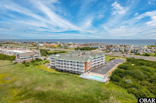 107 W Gray Eagle St Unit 213, Nags Head, NC 27959 - aerial view of a large body of water and a pool area