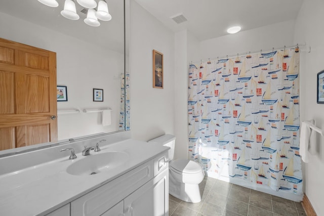 bathroom with toilet, visible vents, vanity, tile patterned floors, and shower / bath combo