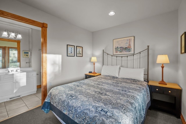 bedroom with tile patterned flooring, visible vents, and recessed lighting