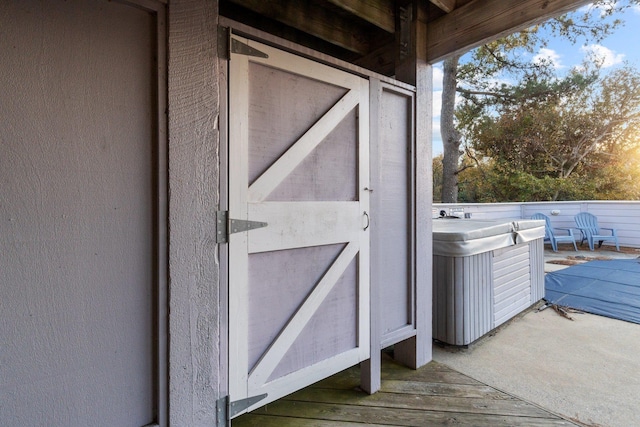 doorway to property featuring brick siding