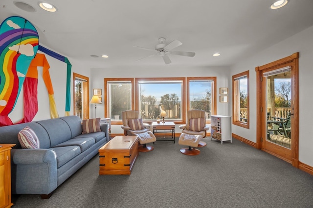 living room with baseboards, carpet flooring, a ceiling fan, and recessed lighting