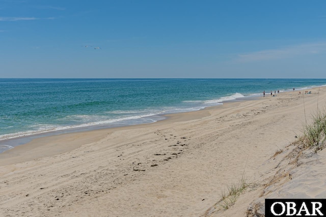 view of water feature featuring a beach view