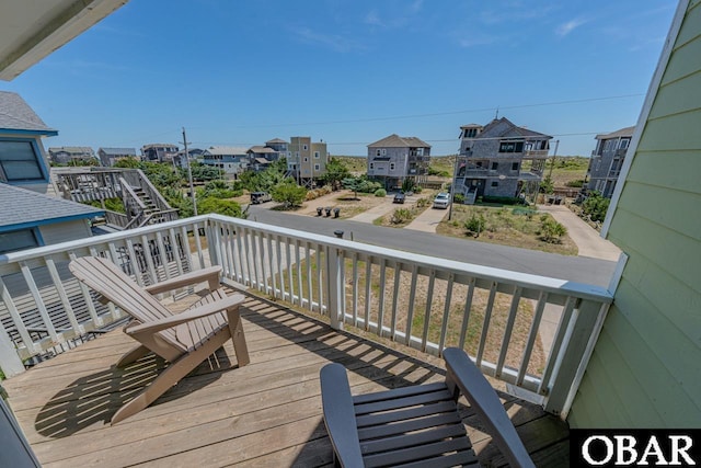 wooden terrace featuring stairway