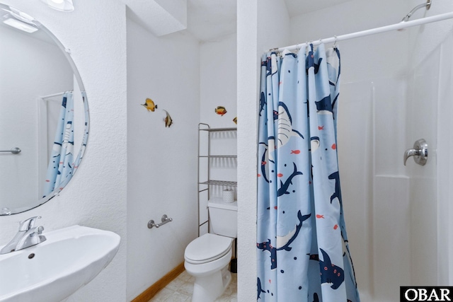770 Bayberry Ct Lot 81, Corolla, NC 27927 - full bathroom featuring a sink, toilet, and a shower with shower curtain