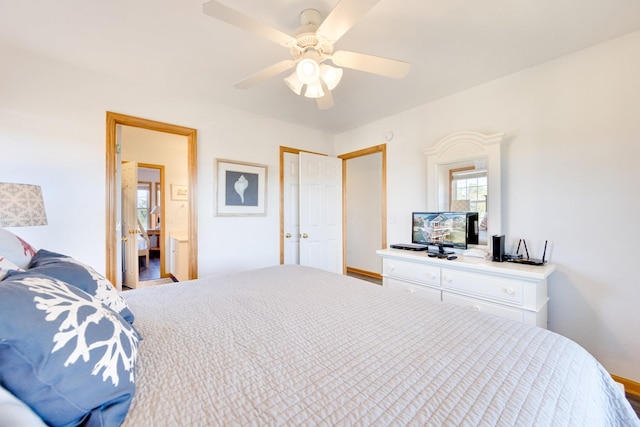 26205 Bluebeard Rd Lot 81, Salvo, NC 27972 - bedroom featuring ceiling fan, baseboards, and ensuite bathroom
