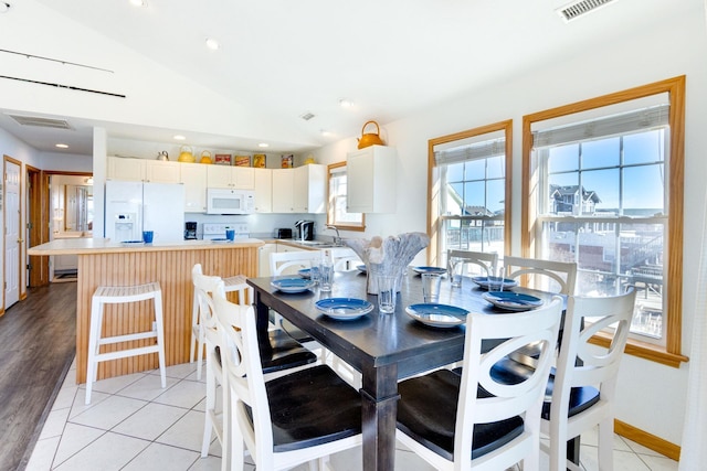 26205 Bluebeard Rd Lot 81, Salvo, NC 27972 - dining space featuring vaulted ceiling and recessed lighting