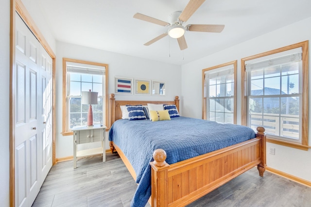 26205 Bluebeard Rd Lot 81, Salvo, NC 27972 - bedroom featuring baseboards, wood finished floors, and a closet
