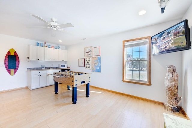 26205 Bluebeard Rd Lot 81, Salvo, NC 27972 - rec room with baseboards, light wood-style floors, recessed lighting, and ceiling fan
