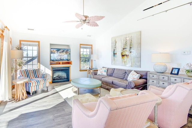 26205 Bluebeard Rd Lot 81, Salvo, NC 27972 - living room with ceiling fan, wood finished floors, a glass covered fireplace, and vaulted ceiling
