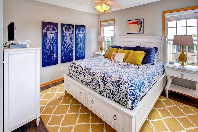 26205 Bluebeard Rd Lot 81, Salvo, NC 27972 - bedroom featuring wood finished floors, baseboards, and ceiling fan