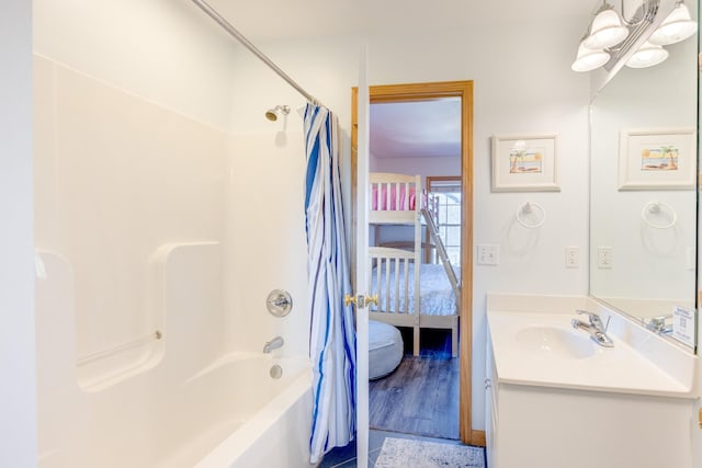 26205 Bluebeard Rd Lot 81, Salvo, NC 27972 - bathroom with connected bathroom, vanity, and shower / bathtub combination with curtain