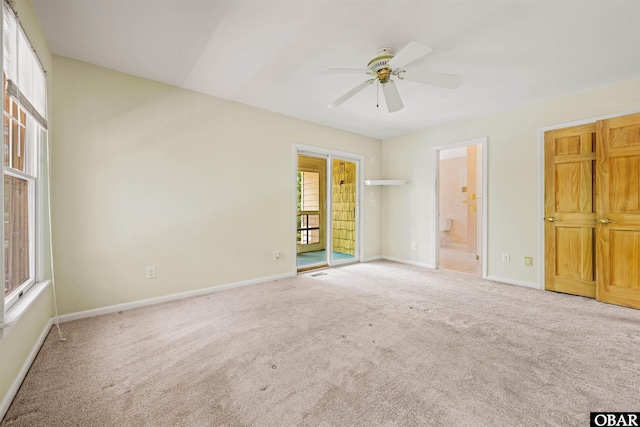 4 Birch Ln Lot 15, Southern Shores, NC 27949 - unfurnished bedroom with carpet, multiple windows, and ensuite bathroom