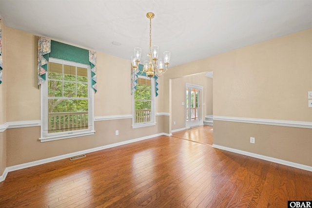 4 Birch Ln Lot 15, Southern Shores, NC 27949 - empty room with a chandelier and hardwood / wood-style flooring