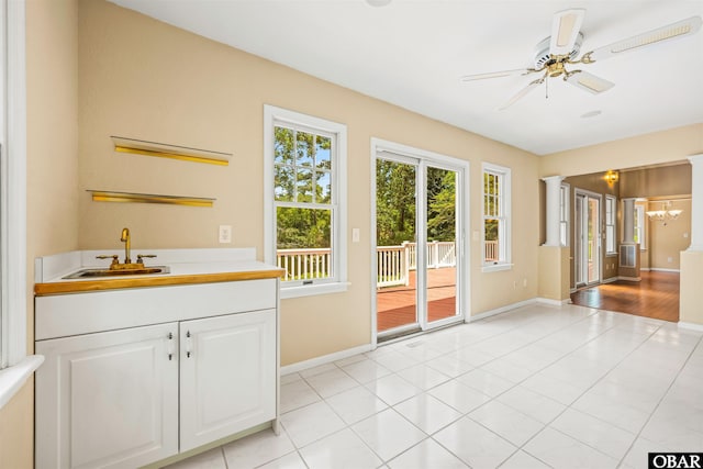 4 Birch Ln Lot 15, Southern Shores, NC 27949 - doorway to outside with ceiling fan, a chandelier, and light tile patterned flooring
