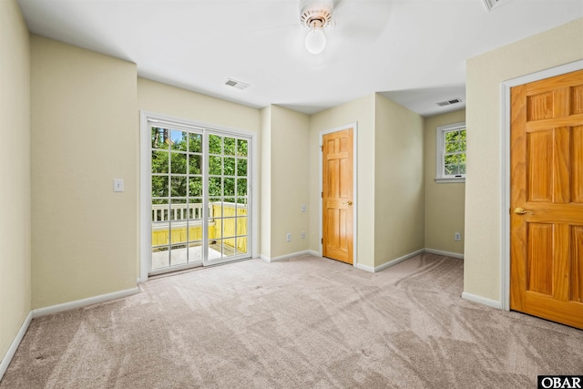 4 Birch Ln Lot 15, Southern Shores, NC 27949 - unfurnished bedroom featuring carpet and access to outside
