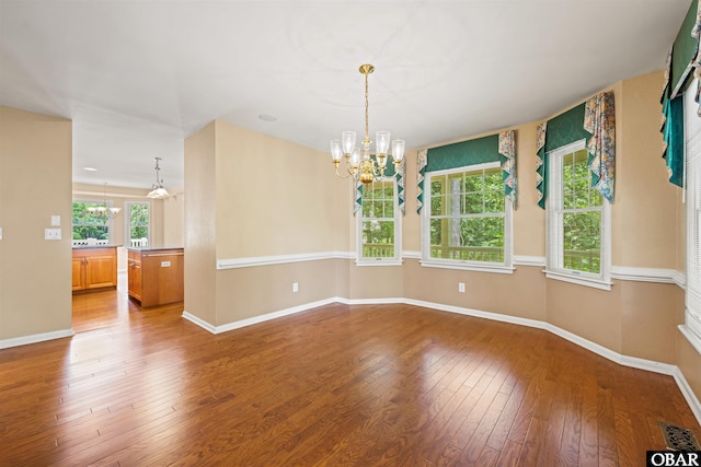 4 Birch Ln Lot 15, Southern Shores, NC 27949 - unfurnished room featuring a chandelier and wood-type flooring