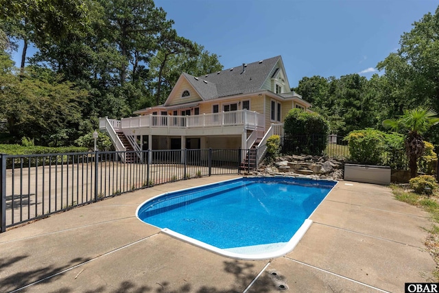4 Birch Ln Lot 15, Southern Shores, NC 27949 - view of swimming pool featuring stairs, a deck, a patio area, and a fenced backyard