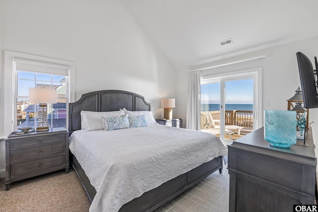 54053 Sandpiper Dr Lot 4, Frisco, NC 27936 - bedroom featuring access to outside, multiple windows, and high vaulted ceiling