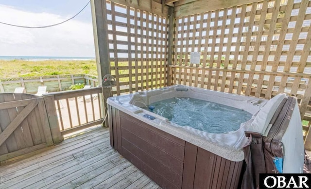 54053 Sandpiper Dr Lot 4, Frisco, NC 27936 - deck featuring a hot tub and a water view