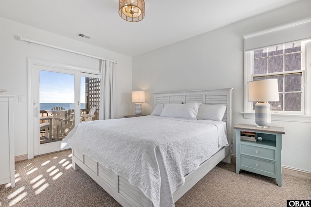 54053 Sandpiper Dr Lot 4, Frisco, NC 27936 - bedroom featuring carpet flooring, access to outside, a water view, and baseboards