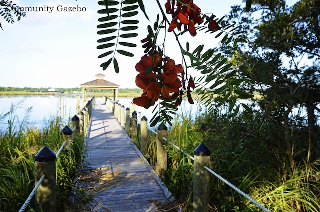 view of dock with a water view