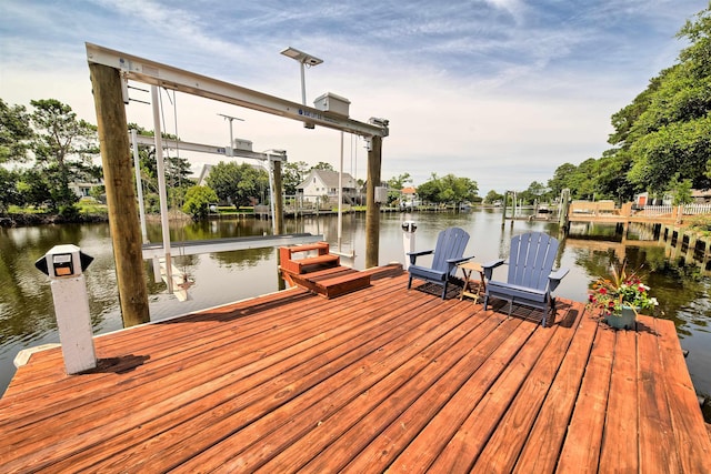 dock area featuring a water view