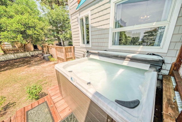 view of patio featuring a hot tub