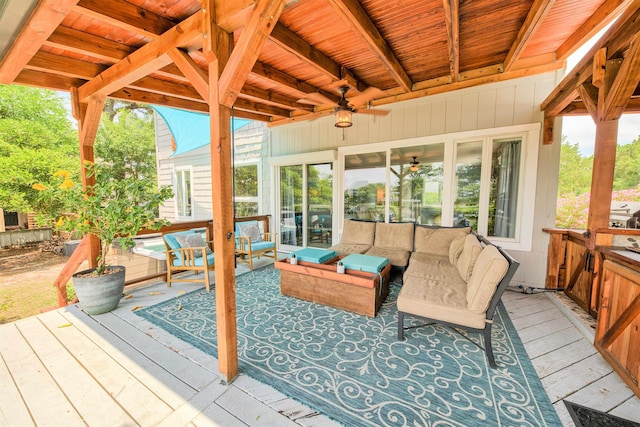 deck with a ceiling fan, visible vents, and an outdoor hangout area