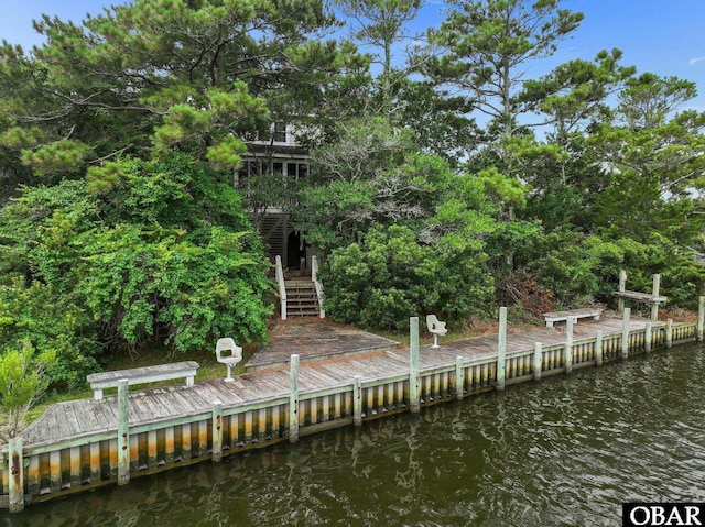 50112 Captains Ct Lot 221, Frisco, NC 27936 - rear view of house with stairway and a water view