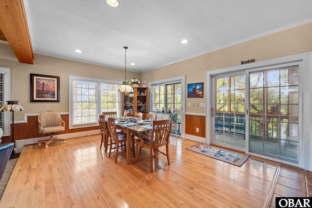 50112 Captains Ct Lot 221, Frisco, NC 27936 - dining space featuring light wood-style flooring, wainscoting, recessed lighting, ornamental molding, and wood walls
