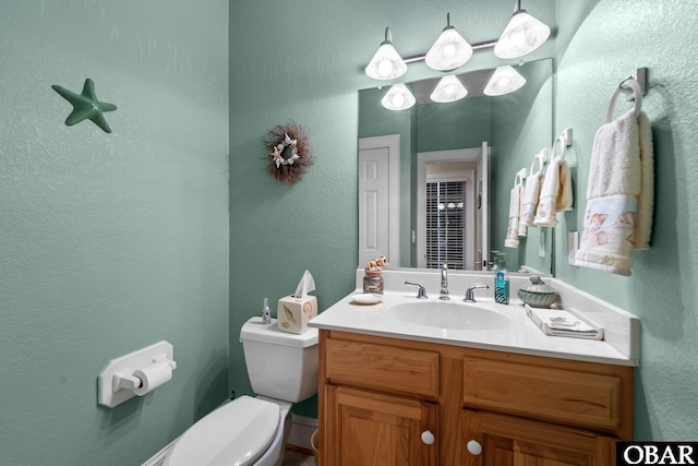 50112 Captains Ct Lot 221, Frisco, NC 27936 - bathroom featuring a textured wall and vanity